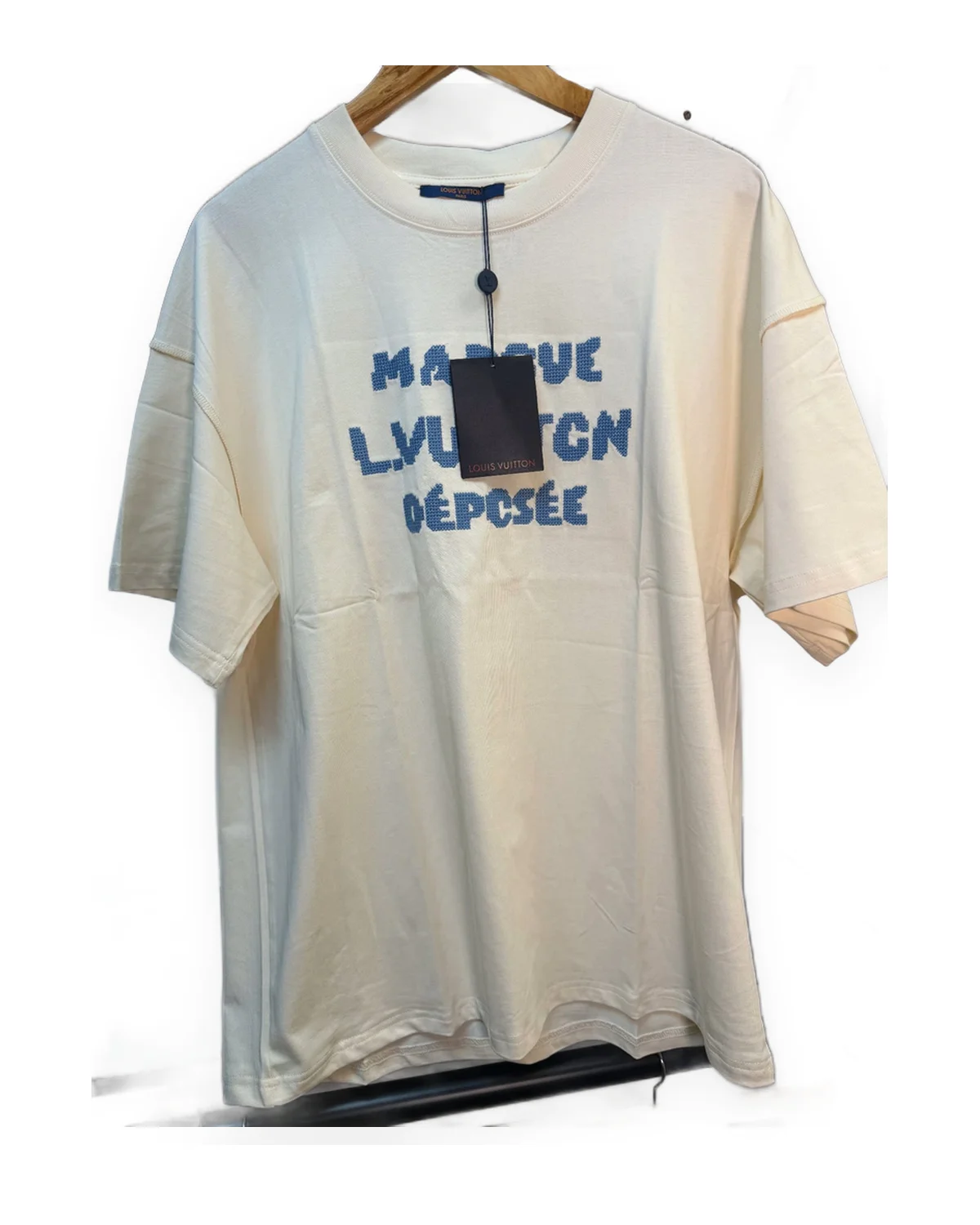 Off-White Boxy Tee with Blue Pixel-Text Graphic