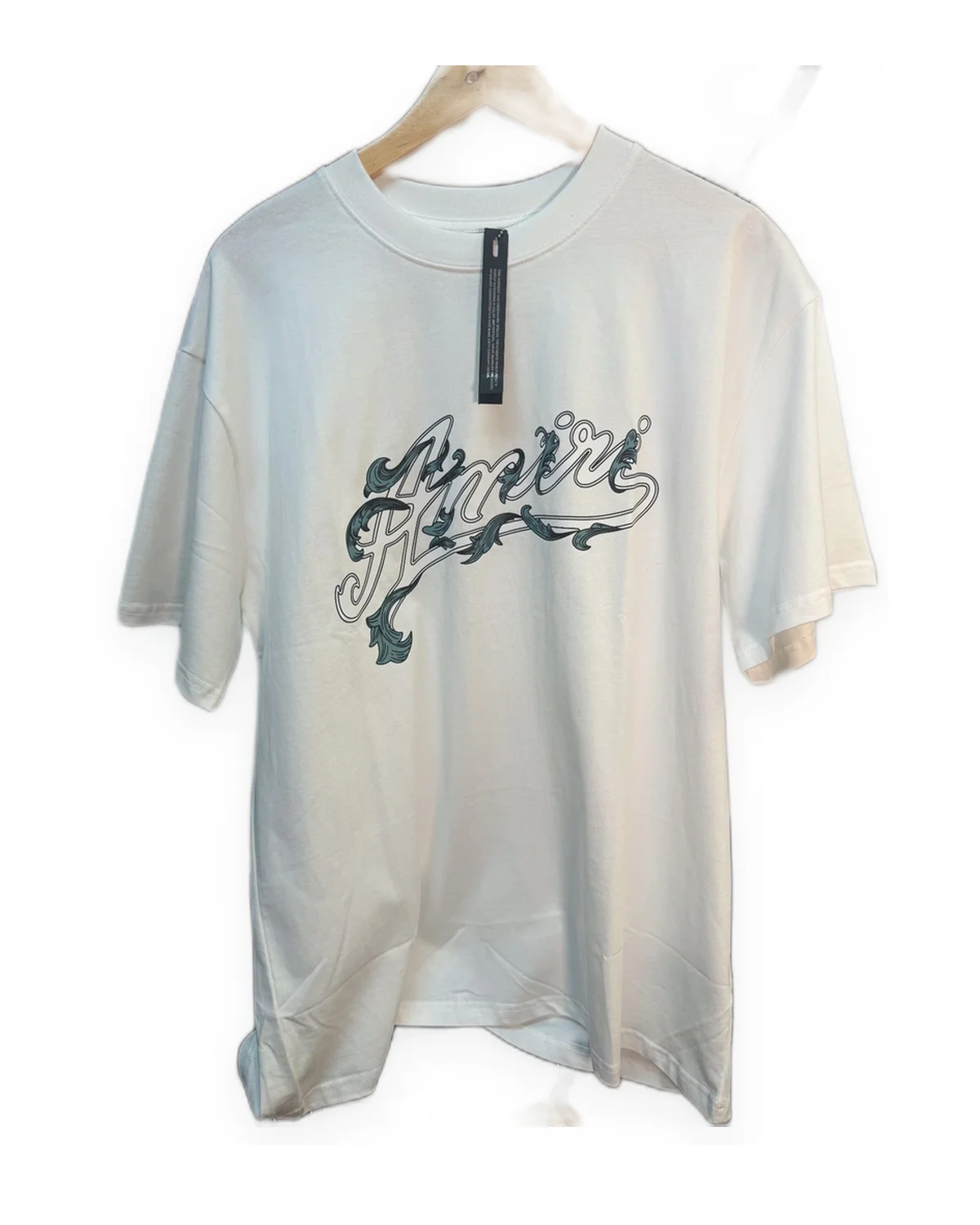 White Boxy Tee with Black Script Wordmark and Leaf Scrollwork
