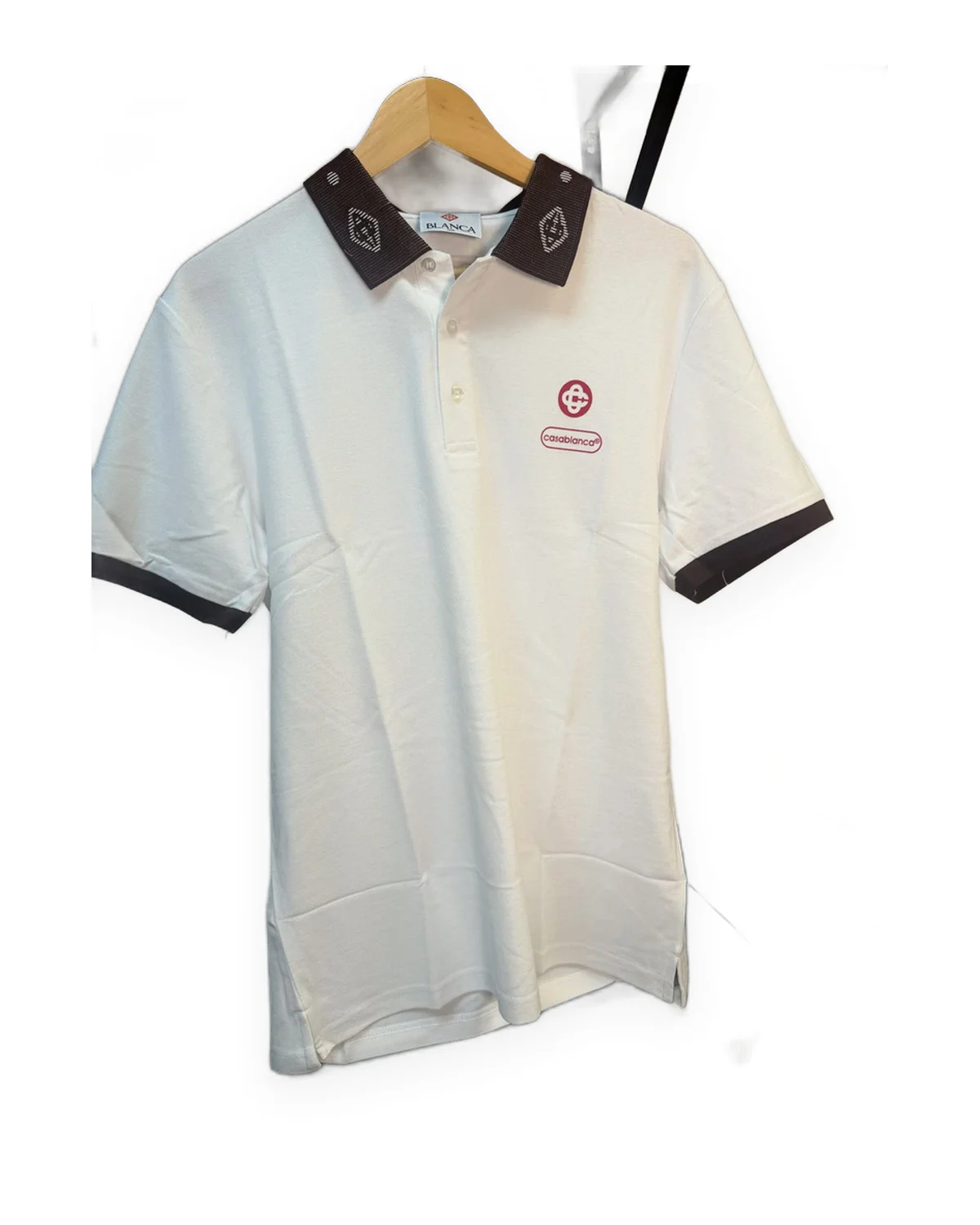 White Pique Polo with Patterned Brown Collar & Red Emblem
