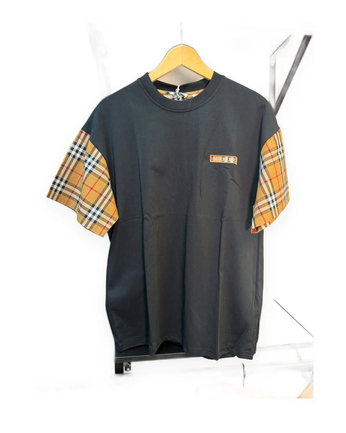 Black Boxy Crewneck Tee with Plaid Sleeves and Chest Patch